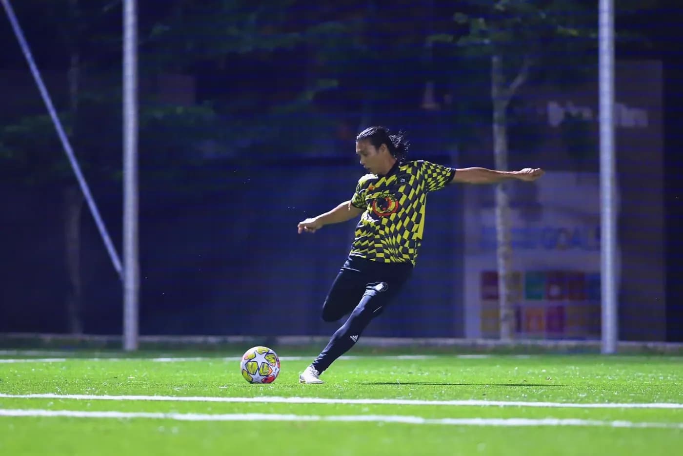 A player about to strike the ball at ArmourX Sports